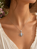 Sterling Silver Moonstone Pendant With Blue Topaz